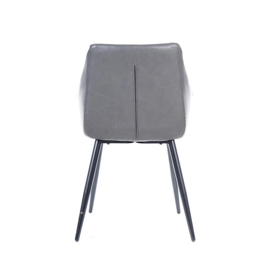 М'які стільці сірого кольору із тканинною оббивкою Signal Bruno на чорних металевих ніжках Польща